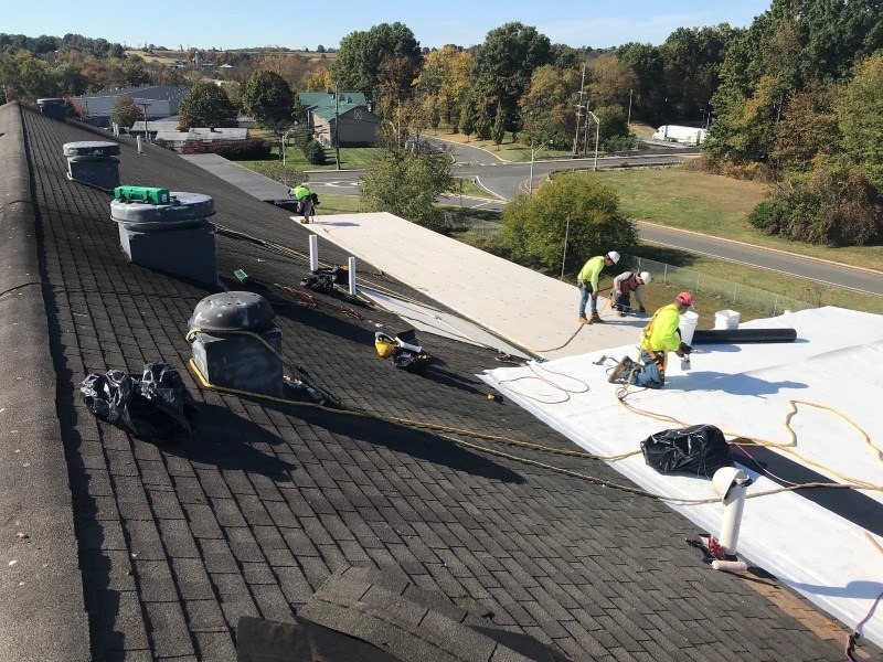 repairs on an asphalt shingle roof