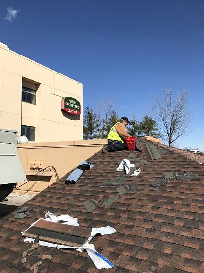emergency repairs to a storm damaged roof
