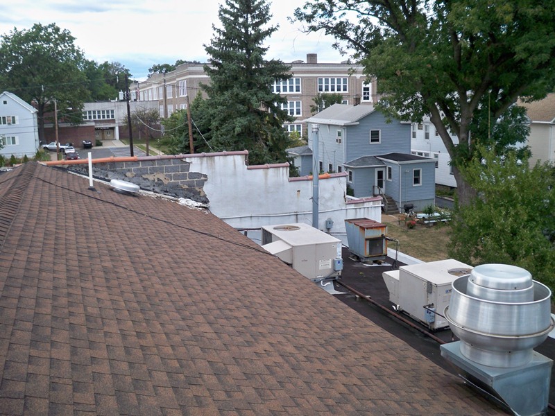 damaged shingle roofing