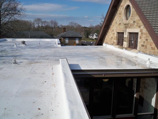 flat roofing system on top of a church