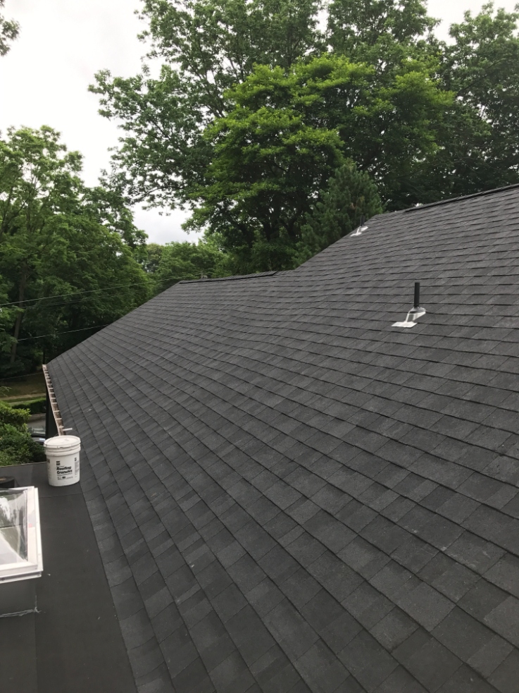overhead view of a home with a shingle roof
