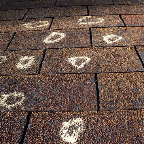 marks on a roof for an insurance claim