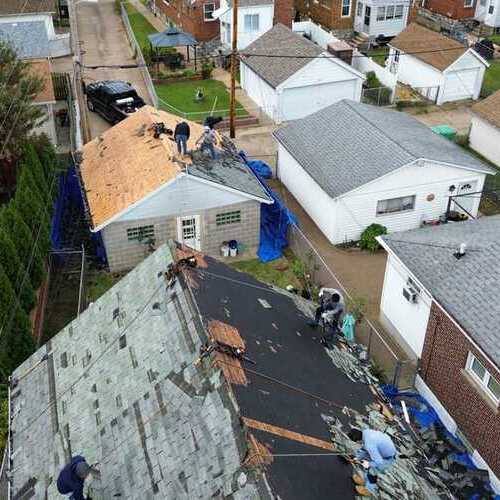 aerial view of a storm damaged roof